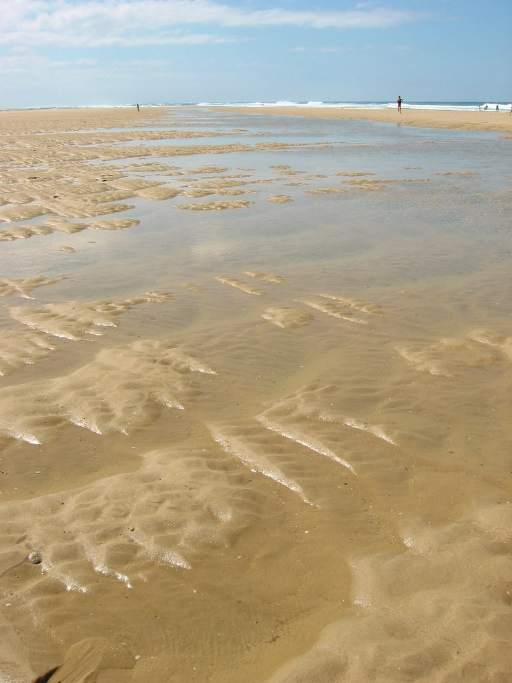 Muster im Sand bei Ebbe